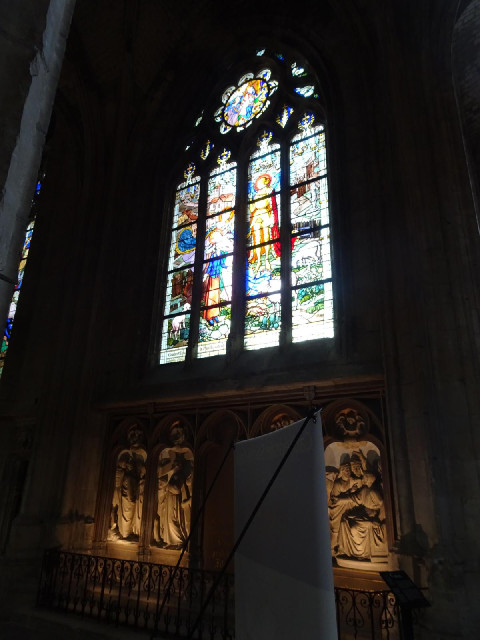 The stained glass windows depict Joan of Arc's actions in the Siege of Orleans.