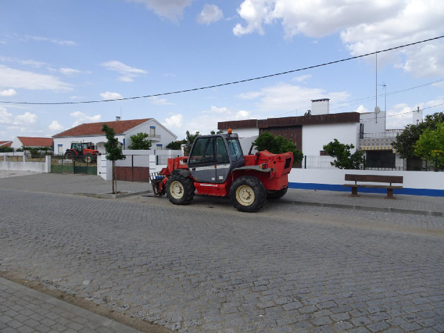 Several of the houses in São Manços have their own tractors.