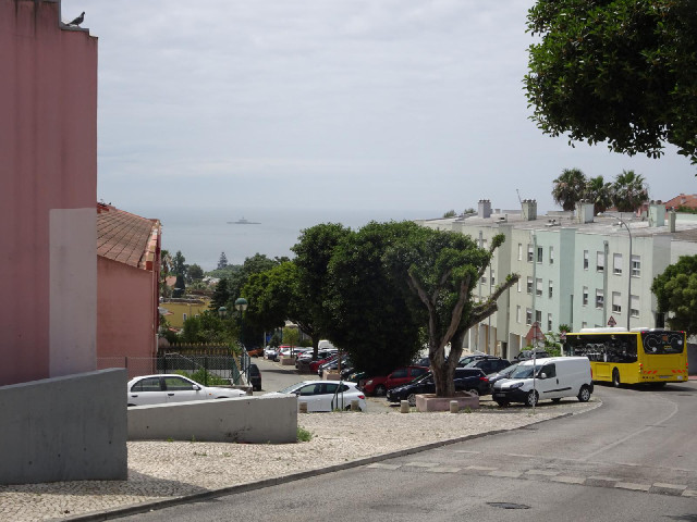 The little island and lighthouse are St. Lawrence's Fort, which sits in the middle of the mouth of t...