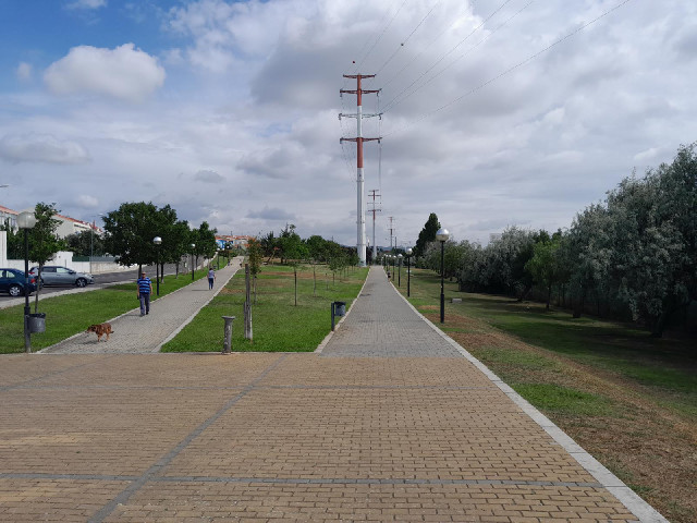 A park under the power lines alongside the motorway.
