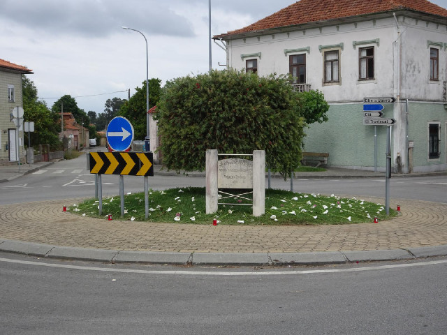 The roundabout has had lilies laid all over it and candles put round the perimeter.