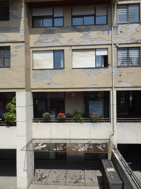 This building has a problem with tiles falling off.