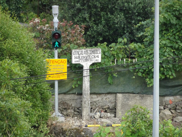 I also have a view of a bit of railway, including these lights at a pedestrian level crossing.