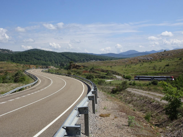 Mountain scenery with a train.