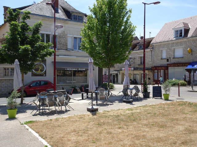 The shop on the corner is called The Improbably Grocer's. Mind you, the town does have a rather impr...