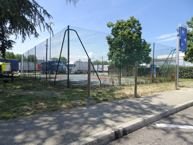 This motorway service station has a tennis court.