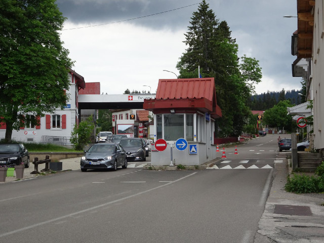 The cars on the left are coming across the border from Switzerland to France. My road, on the right,...