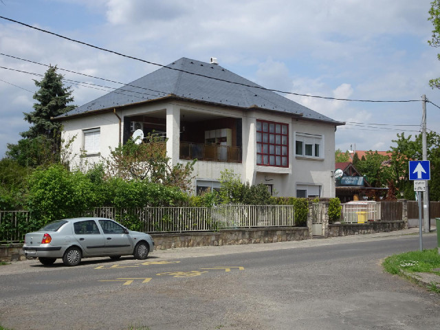 That house has one entire open-air room. It looks to have as much furniture in it as any room would ...