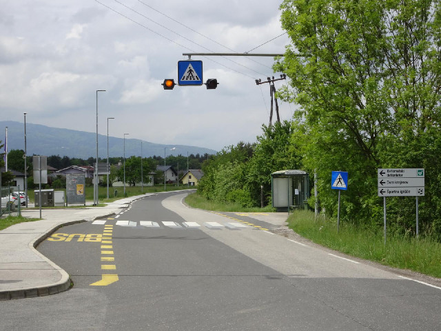 The zebra crossing stripes have a three-dimensional effect.