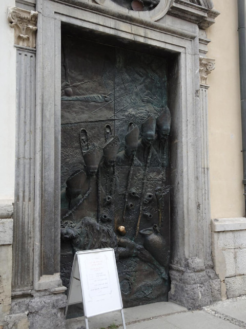 The Catholic Cathedral has fancy doors.