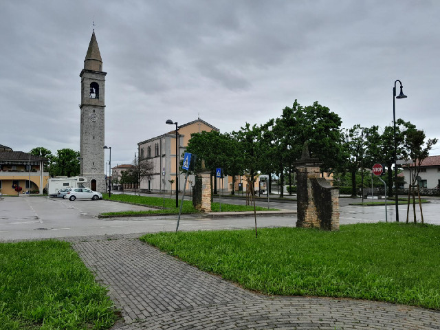 It's quite common in Northern Italy for a bell tower to be separate from its church. Here they are o...
