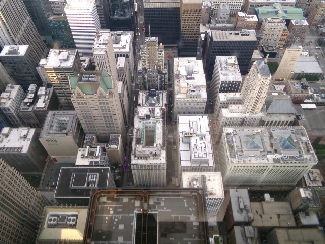 The black area in the bottom middle of the picture is another part of the Sears Tower. The tower is ...